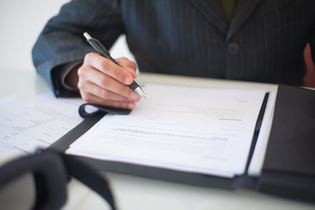 Reporting governance — who signs, and on what basis
